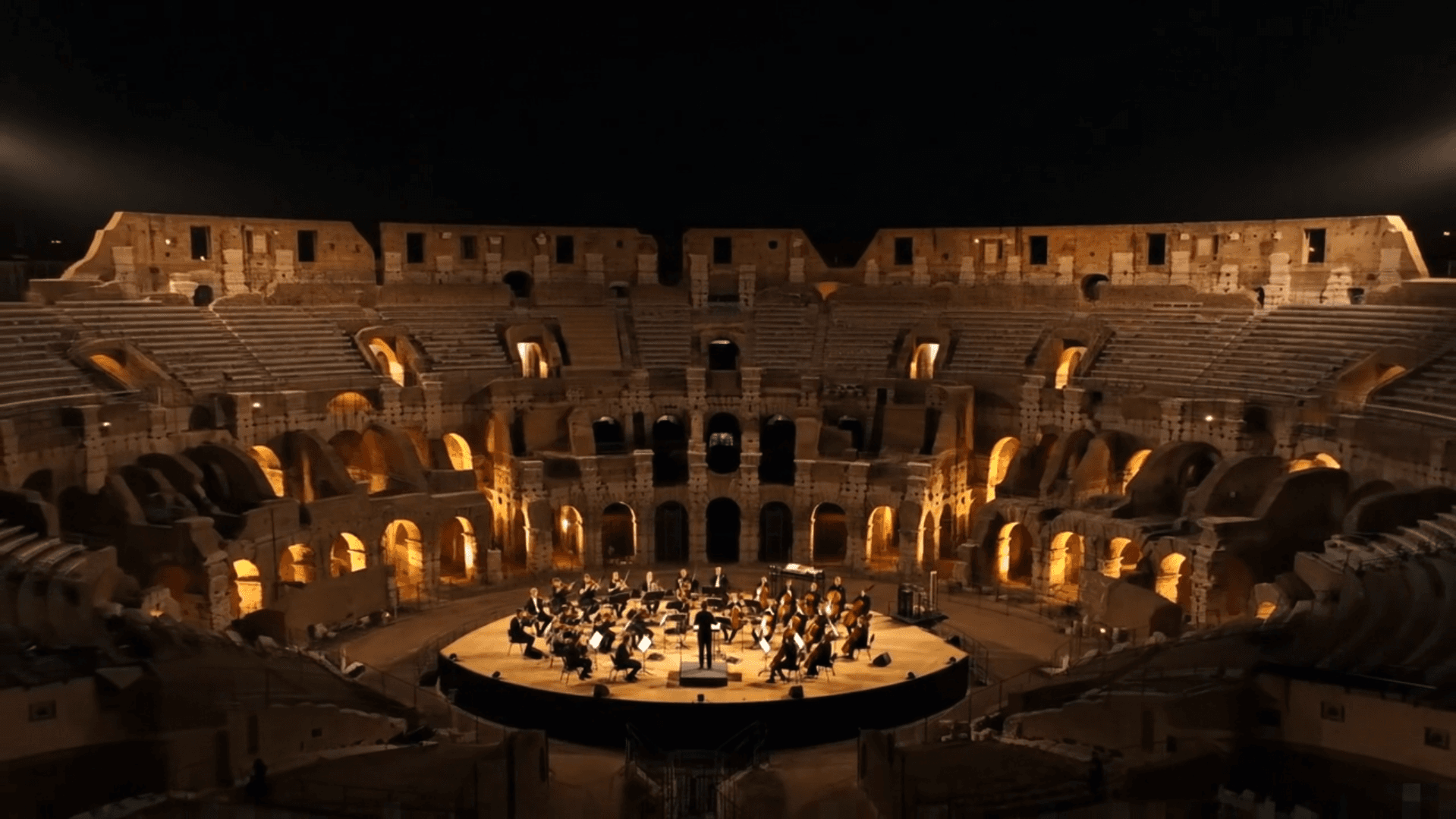 Concert inside a historic arena, embodying the fusion of music and heritage