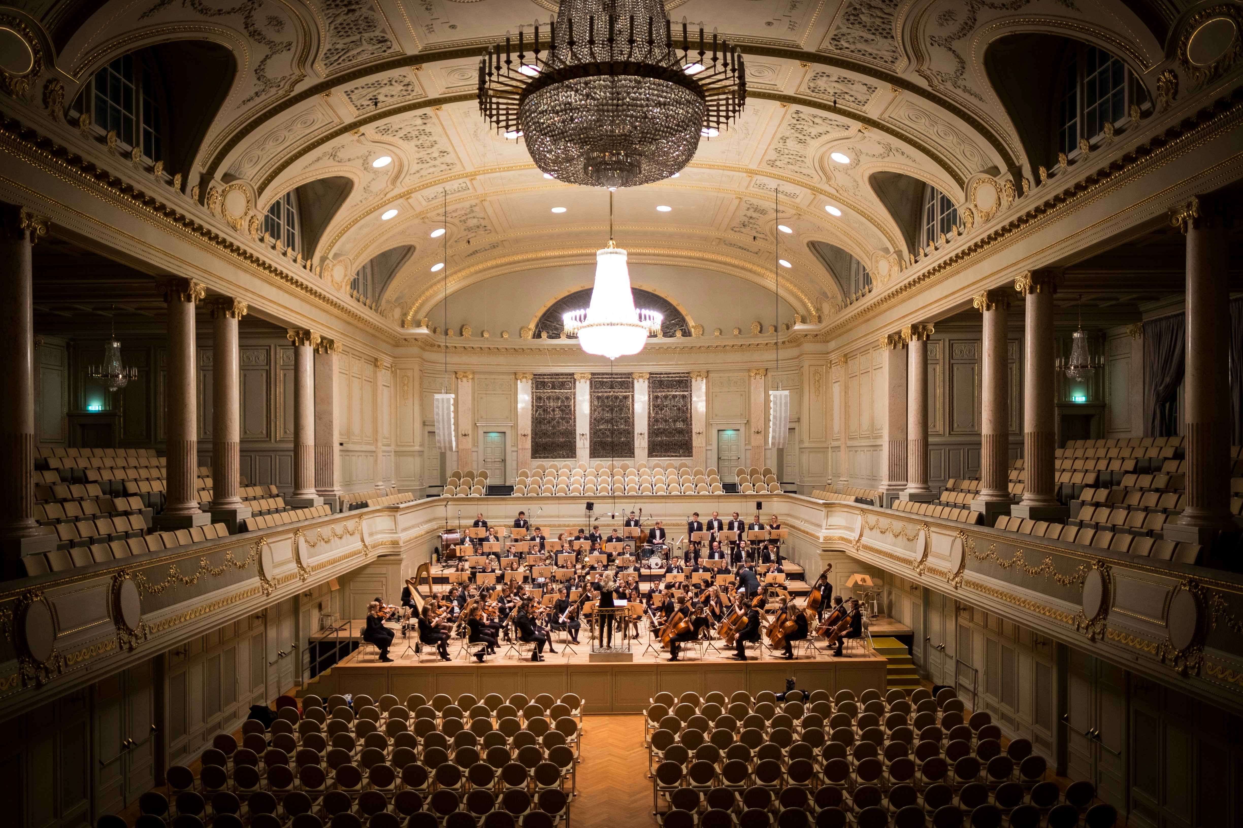A string quartet performing in a grand, historic Italian cathedral